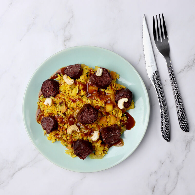 Boudin antillais, riz pomme et curry et noix de cajou