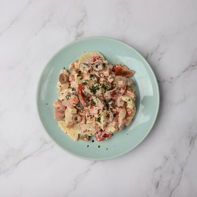 Salade de pomme de terre olive verte chèvre frais et cervelas